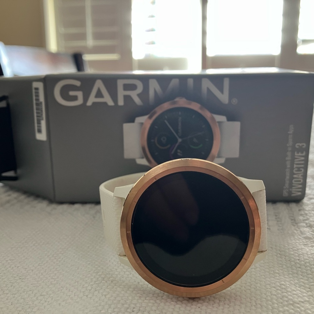 Garmin Smartwatch with Rose Gold Bezel and White Band